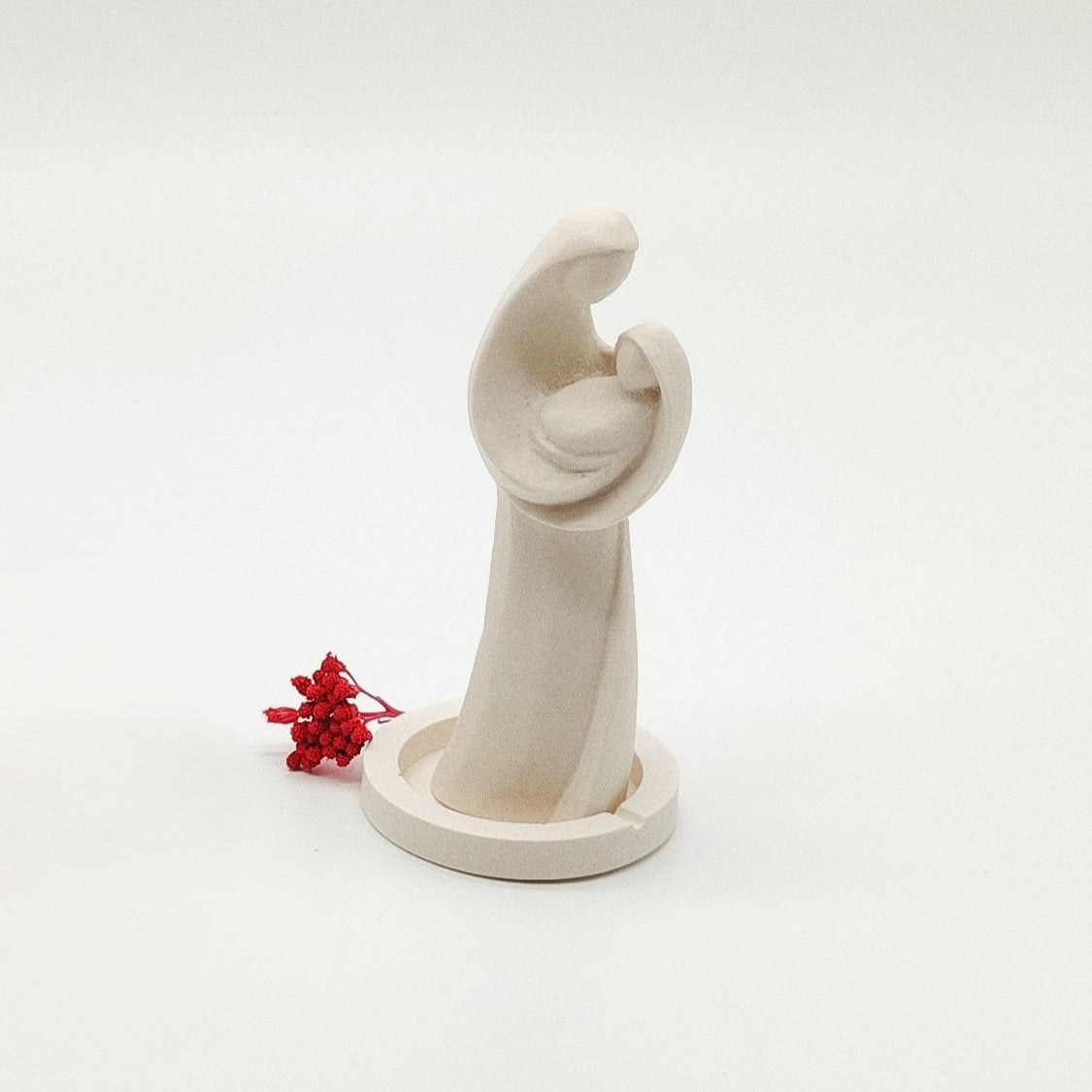 Estatueta Colo de Mãe